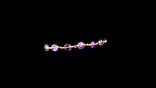 Load image into Gallery viewer, Purple beaded bracelet on a black background