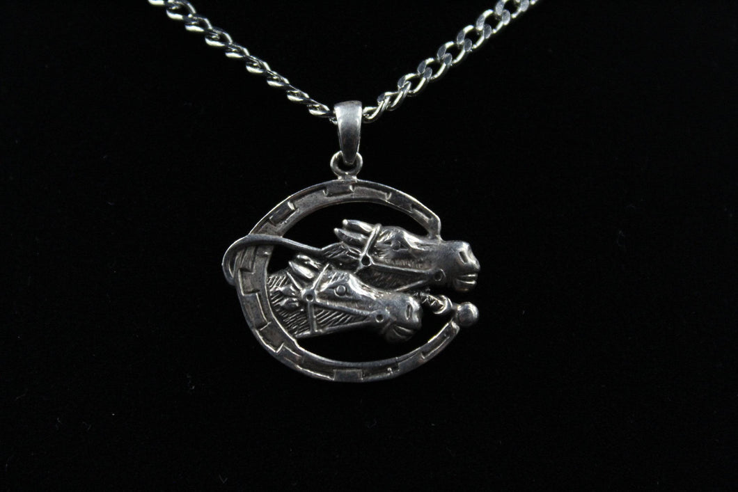 Sterling Silver Horseshoe With Double Horse Head Pendant